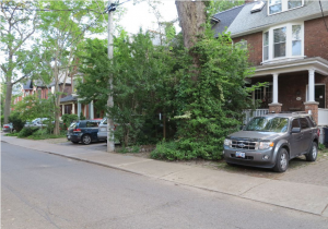 Parking pad in June 2018 before conversion to garden